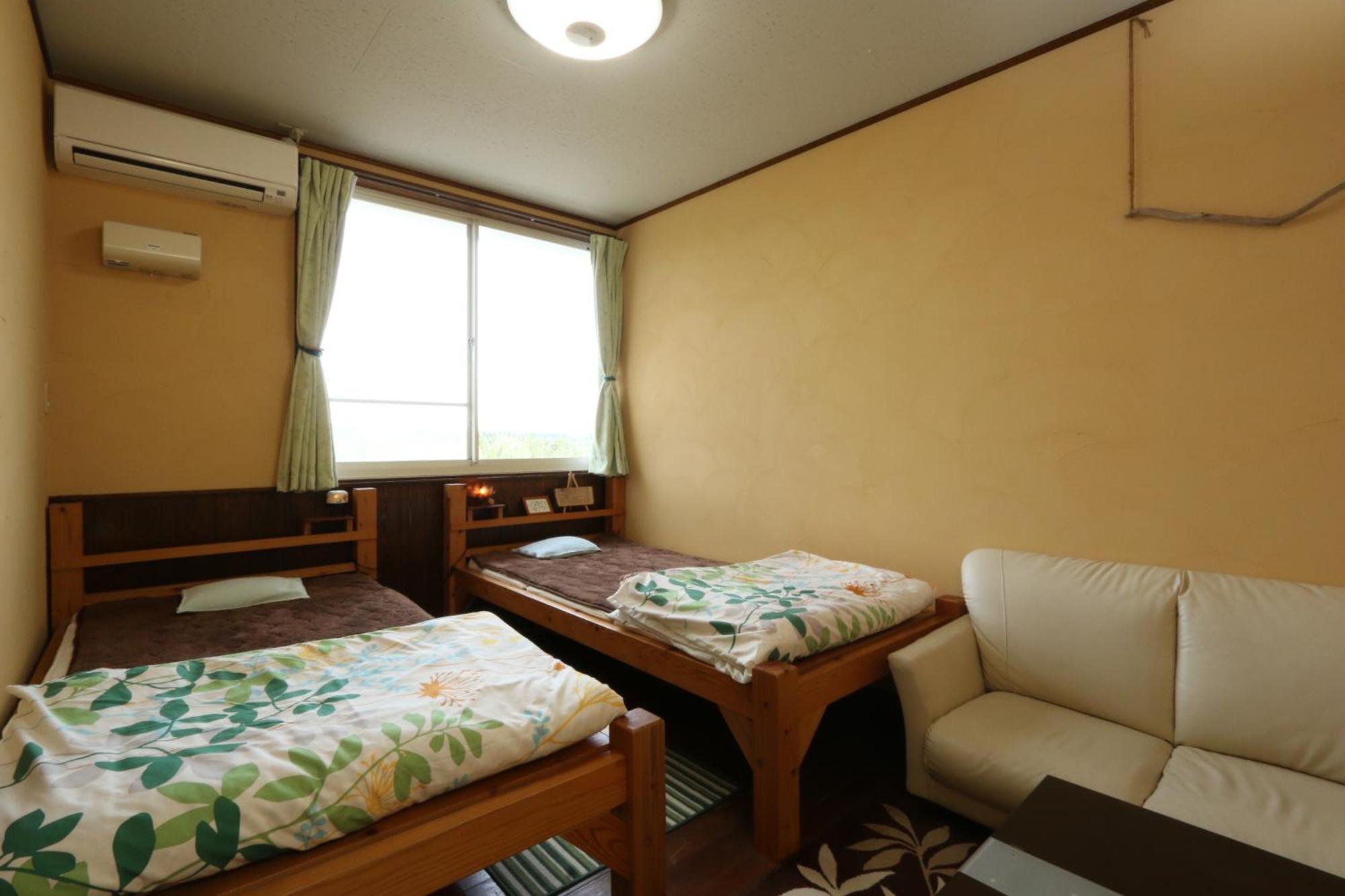 Tanegashima Minshuku Yuyu Hotel Minamitane Quarto foto